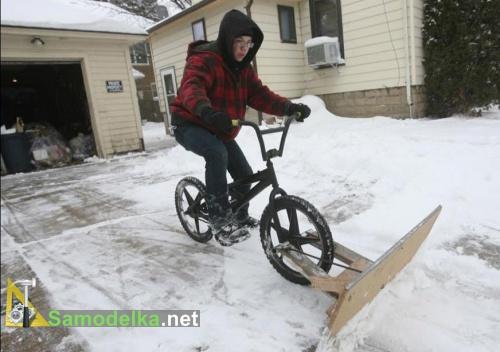 велосипед с лопатой