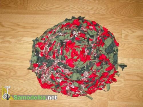 Самодельный шитый коврик из сплетенных косой лент